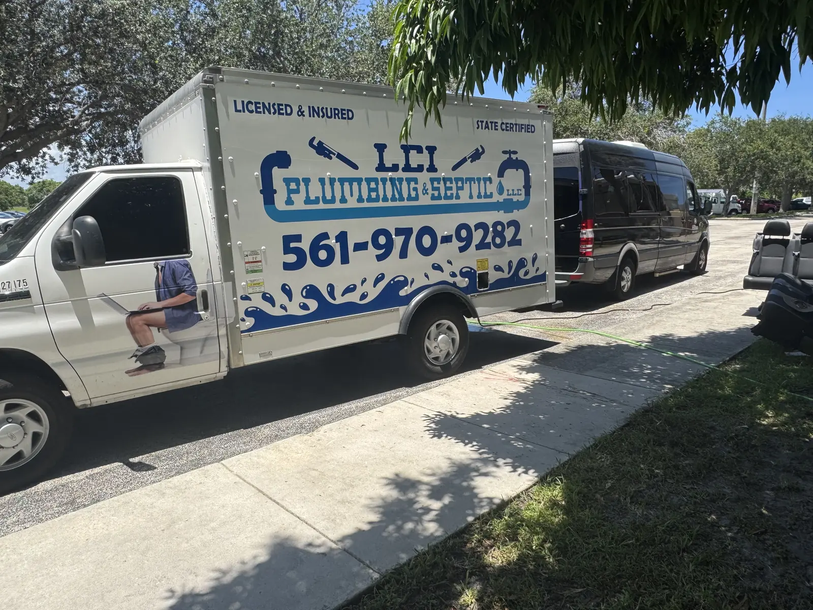 LCI Plumbing & Septic box truck, licensed and insured