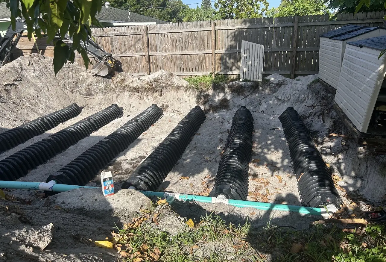 Drain field chambers in a fenced backyard