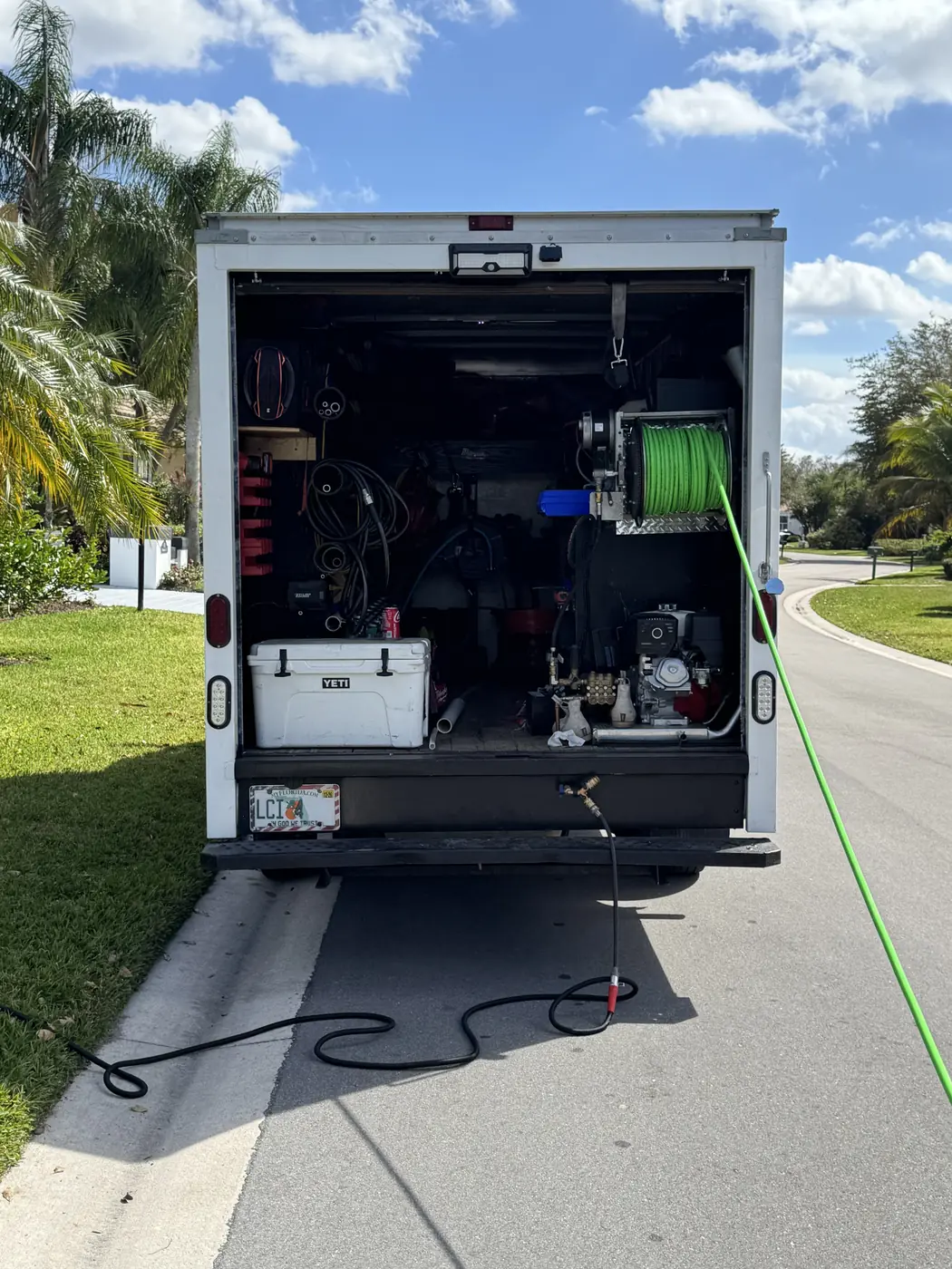 Jetter hose run from the back of an LCI truck